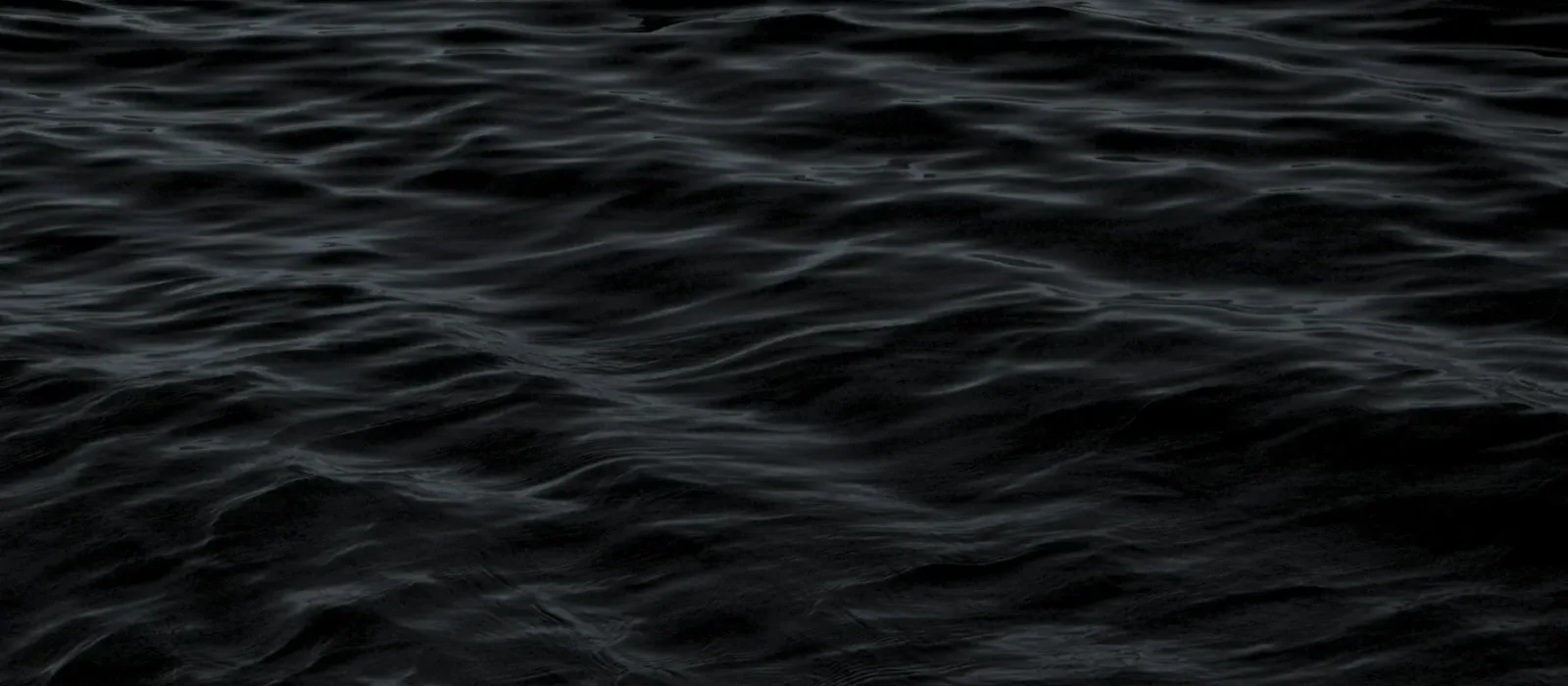 Dark ocean surface seen from above