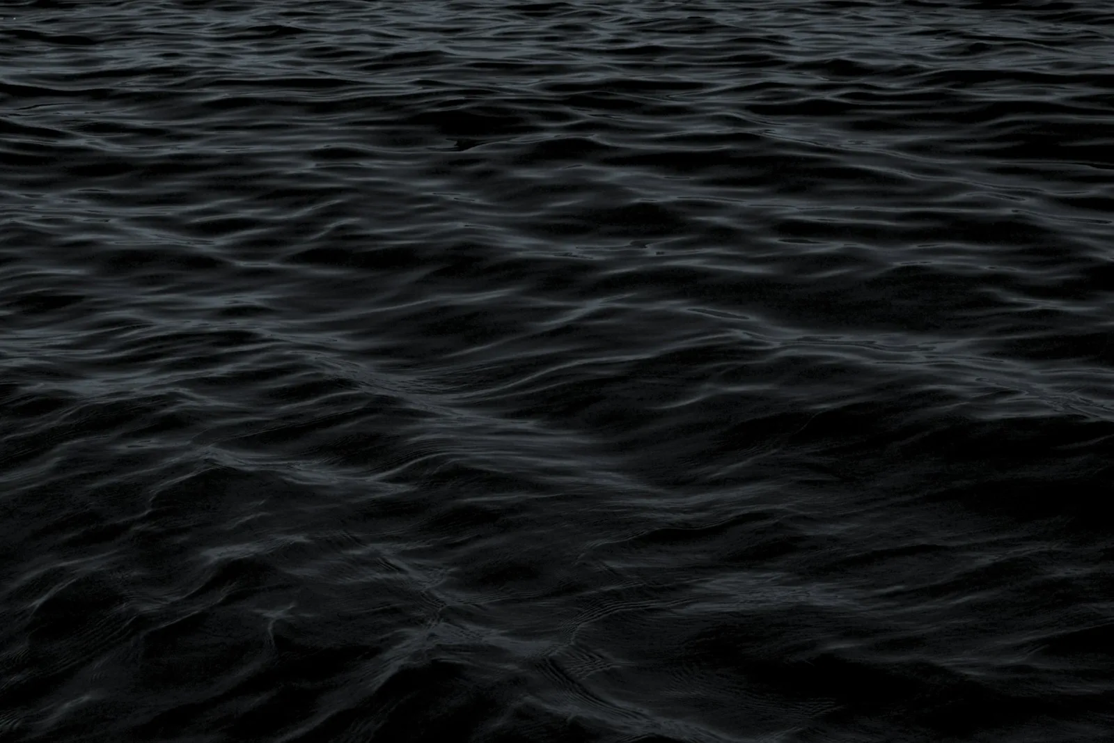 Dark ocean surface seen from above